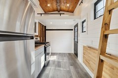 tiny home on wheels , double axel 20 foot steel framing trailor mounted
