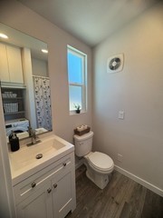 New Forever Tiny Home on Wheels 32′ studio Single Story with full kit & bath