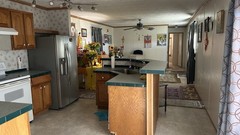 80×14 Single Wide Mobile Home 2 Car Garage & 25×10 Storage Building & Carport
