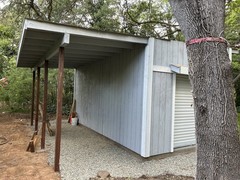 Contemporary Car Garage, Roll-Up Door, Covered Side, Wood Metal, Gray Exterior