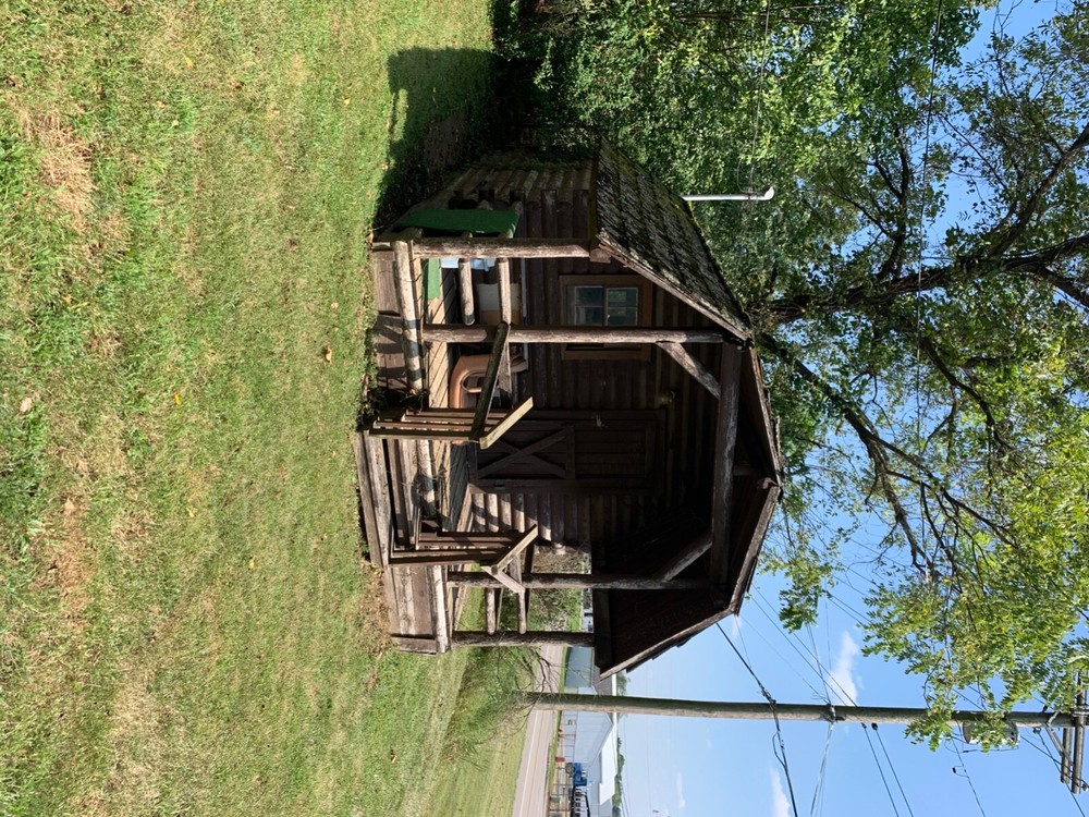 12×12 wooden log cabin storage buildings sheds, one bedroom, two side windows