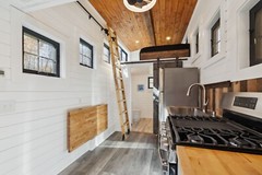 tiny home on wheels , double axel 20 foot steel framing trailor mounted