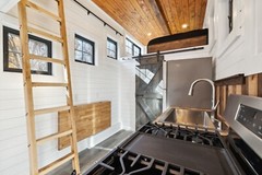 tiny home on wheels , double axel 20 foot steel framing trailor mounted