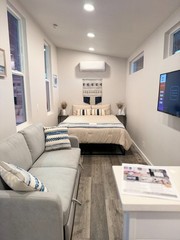 New Forever Tiny Home on Wheels 32′ studio Single Story with full kit & bath