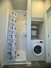 New Forever Tiny Home on Wheels 32′ studio Single Story with full kit & bath