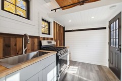 tiny home on wheels , double axel 20 foot steel framing trailor mounted