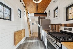 tiny home on wheels , double axel 20 foot steel framing trailor mounted