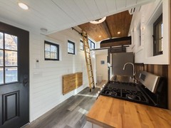 tiny home on wheels , double axel 20 foot steel framing trailor mounted