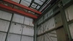 Steel Building aprox 51 feet by 109 feety 25 ft tall green building 2 trolley