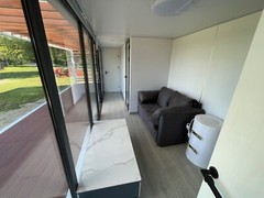 Tiny home cabin with patio deck, fully furnished and equipped with appliances