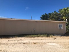 Fixer uper beige modular home for sale
