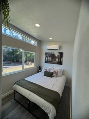 New Forever Tiny Home on Wheels 40′ Suite with bed closet & full kit & bath