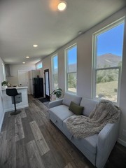 New Forever Tiny Home on Wheels 40′ Suite with bed closet & full kit & bath